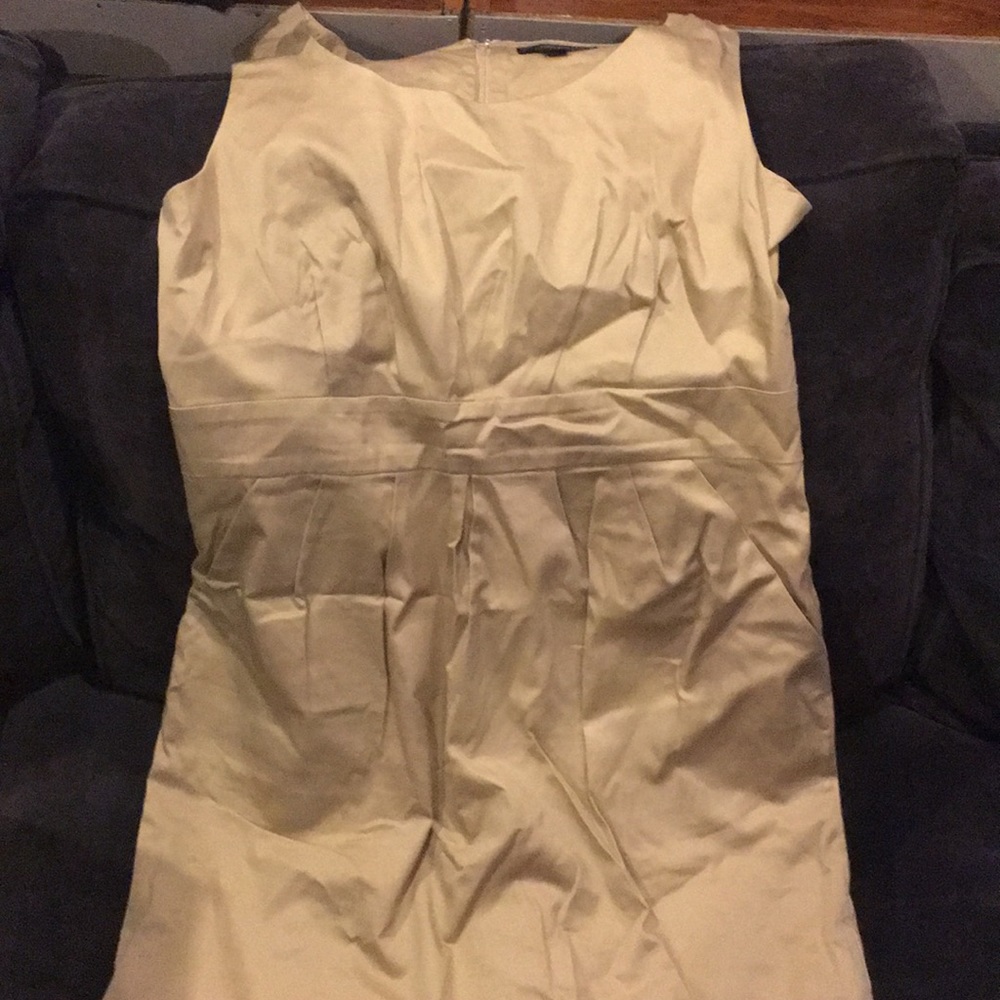 Tan pleated sleeveless dress